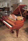 Restored, 1933, Bechstein Model K baby grand piano with a polished, mahogany case and square, tapered legs