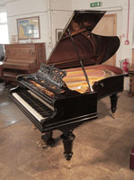 Restored, 1902, Bechstein Model V grand piano for sale with a black case, filigree music desk and turned, faceted legs