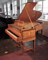 Restored, 1910, Bechstein Model B grand piano with a book-matched, satinwood case with boxwood stringing. Entire cabinet inlaid with festoons of swagged bellflowers and bows.