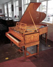 Restored, 1910, Bechstein Model B grand piano with a book-matched, satinwood case with boxwood stringing. Entire cabinet inlaid with festoons of swagged bellflowers and bows