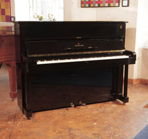 Reconditioned, 1960, Steinway Model Z upright piano for sale with a black case and brass fittings. Piano has an eighty-eight note keyboard and two pedals £15,000.
