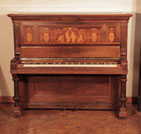 Reconditioned, 1894, Steinway upright piano for sale with a polished, rosewood case. Cabinet panels inlaid in with dancing ladies. Piano has an eighty-five note keyboard and two pedals. 