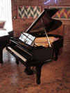 Rebuilt, 1975, Steinway Model O grand piano for sale with a black case and spade legs. Piano has an eighty-eight note keyboard and a two-pedal lyre.
 